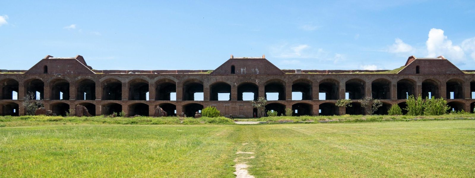pexels-photo-28084072-28084072 Explore the architectural marvel of Fort Jefferson with its stunning brickwork and expansive lawns.